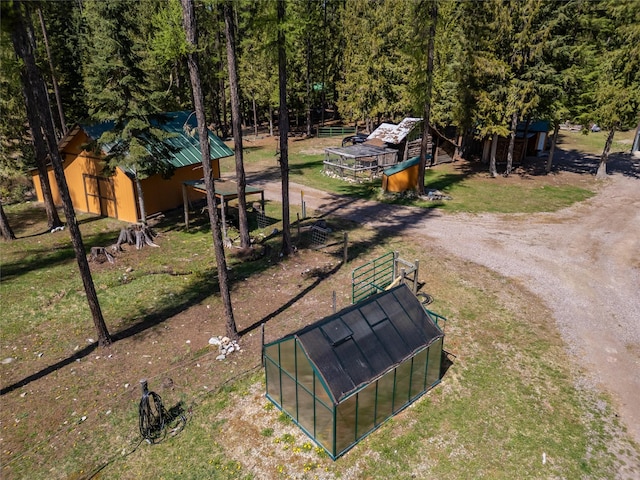 drone / aerial view with a view of trees