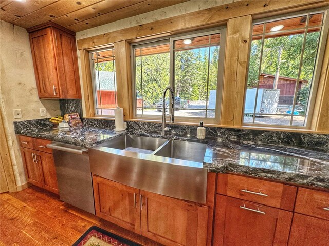 dining space with wooden ceiling, a wealth of natural light, and hardwood / wood-style floors