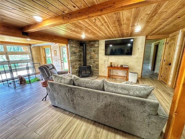 office area featuring carpet flooring, wooden ceiling, and baseboards