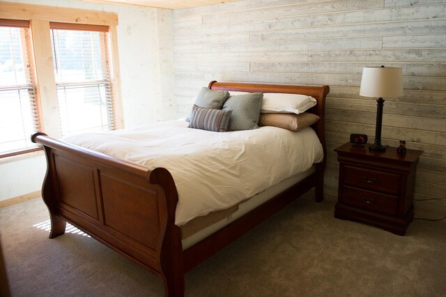 full bathroom featuring toilet, wood finished floors, vanity, visible vents, and shower / bathtub combination with curtain