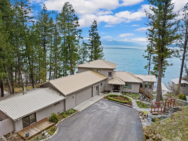 exterior space with a water view