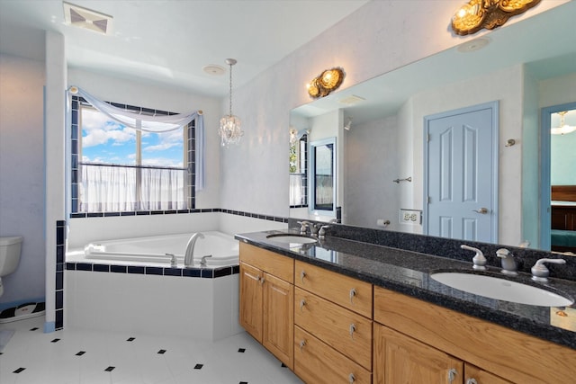 full bath with a bath, a wealth of natural light, and a sink