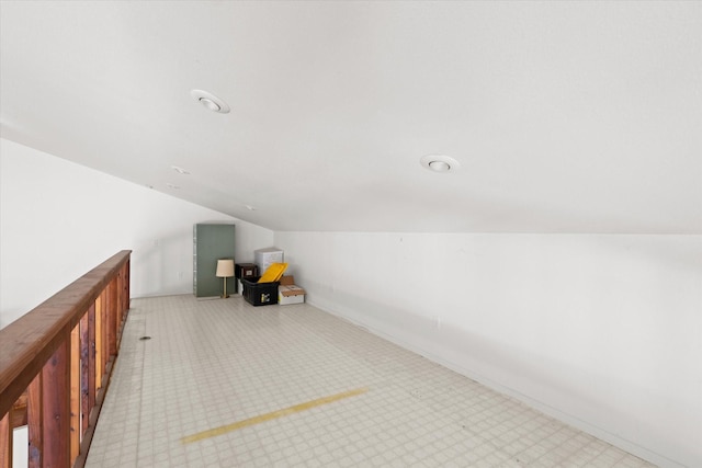 additional living space with lofted ceiling