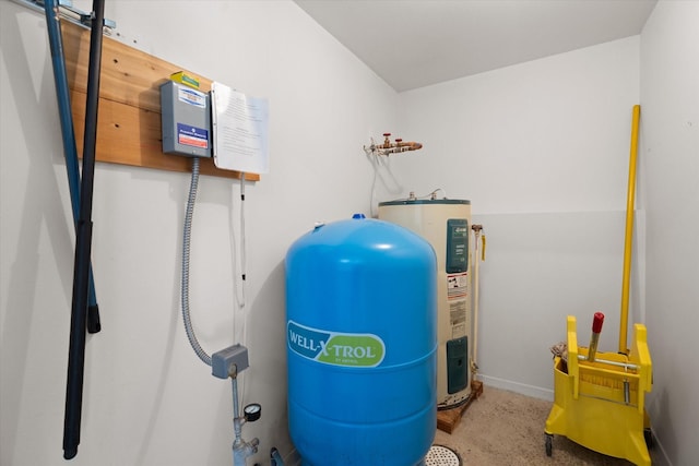 utility room featuring electric water heater
