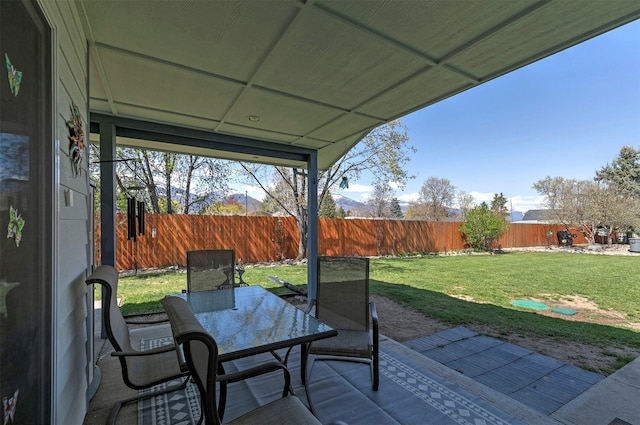 view of patio / terrace featuring outdoor dining space and a fenced backyard