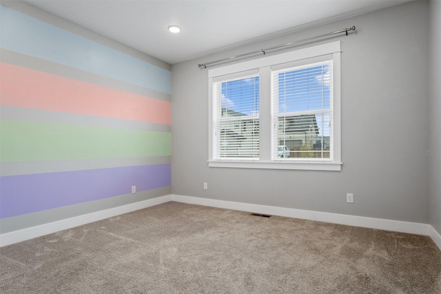 2421 Half Hitch Dr, Missoula, MT 59808 - unfurnished room featuring visible vents, baseboards, and carpet floors