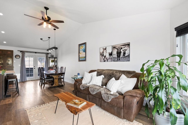 living area featuring lofted ceiling, recessed lighting, dark wood-style floors, a ceiling fan, and baseboards