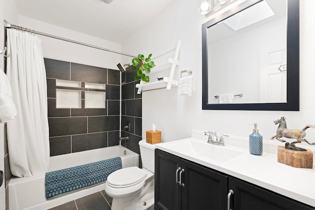 bathroom with toilet, shower / tub combo with curtain, and vanity