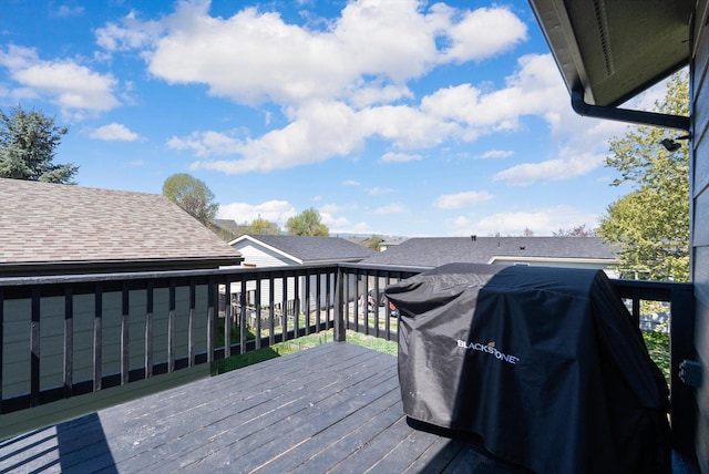 wooden deck with area for grilling