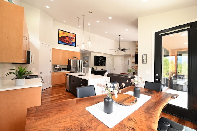 2 Mahonia Ct, Plains, MT 59859 - bedroom featuring baseboards, high vaulted ceiling, and wood finished floors