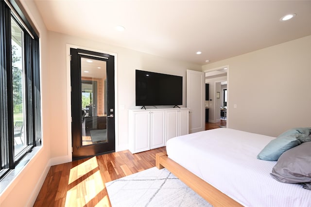 2 Mahonia Ct, Plains, MT 59859 - full bath with a shower stall, hardwood / wood-style floors, a sink, and baseboards