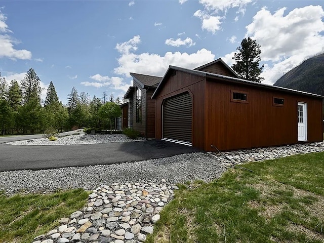 2 Mahonia Ct, Plains, MT 59859 - view of property exterior with a garage
