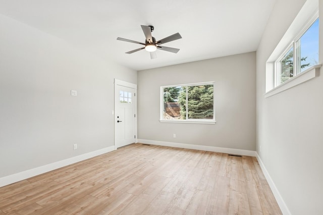 268 Landing Ln, Kalispell, MT 59901 - spare room featuring light wood finished floors, a ceiling fan, and baseboards