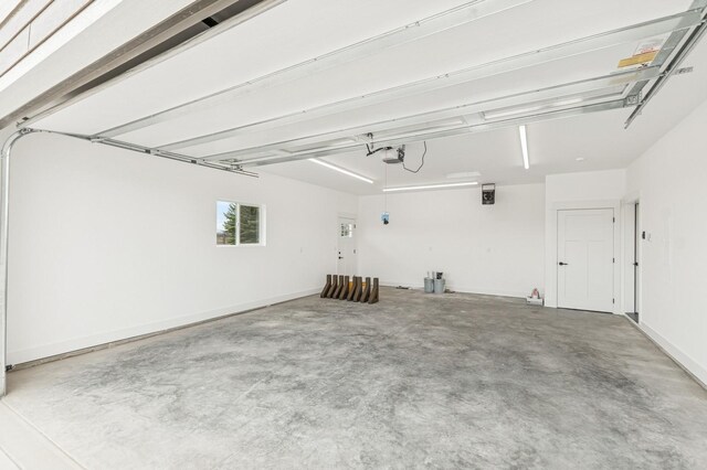 268 Landing Ln, Kalispell, MT 59901 - garage featuring a garage door opener