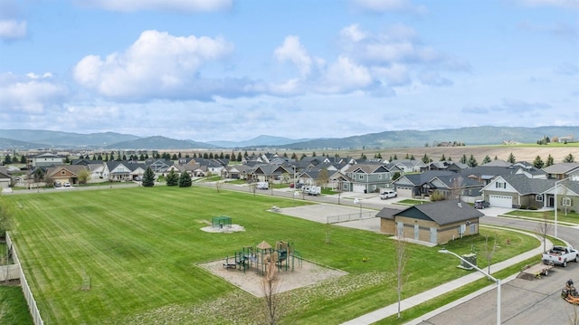 aerial view featuring a mountain view and a residential view