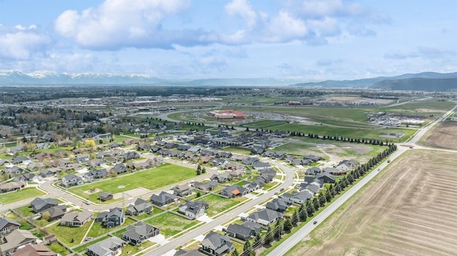 drone / aerial view featuring a mountain view and a residential view