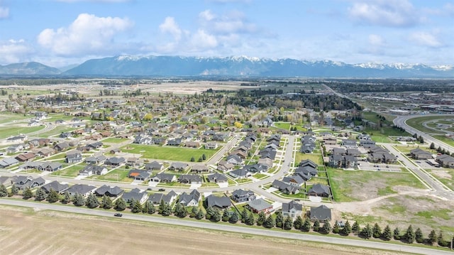 aerial view featuring a residential view and a mountain view