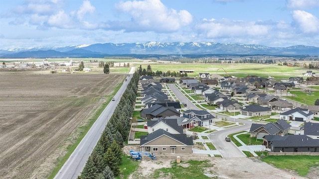 drone / aerial view with a mountain view and a residential view