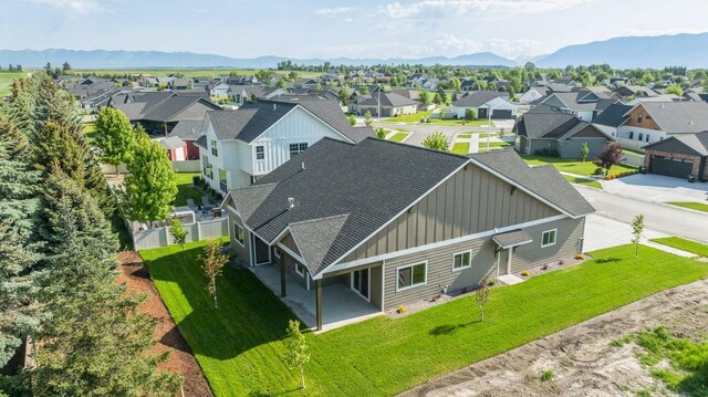268 Landing Ln, Kalispell, MT 59901 - aerial perspective of suburban area featuring mountains