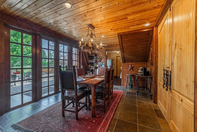 420 Deer Creek Rd, Lakeside, MT 59922 - dining area with a chandelier, healthy amount of natural light, wooden ceiling, wood walls, and recessed lighting