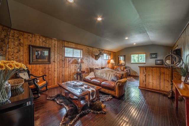 420 Deer Creek Rd, Lakeside, MT 59922 - living room with vaulted ceiling, wooden walls, and hardwood / wood-style flooring