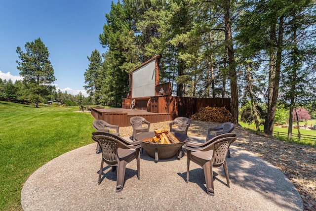 420 Deer Creek Rd, Lakeside, MT 59922 - view of patio / terrace with a fire pit and a hot tub