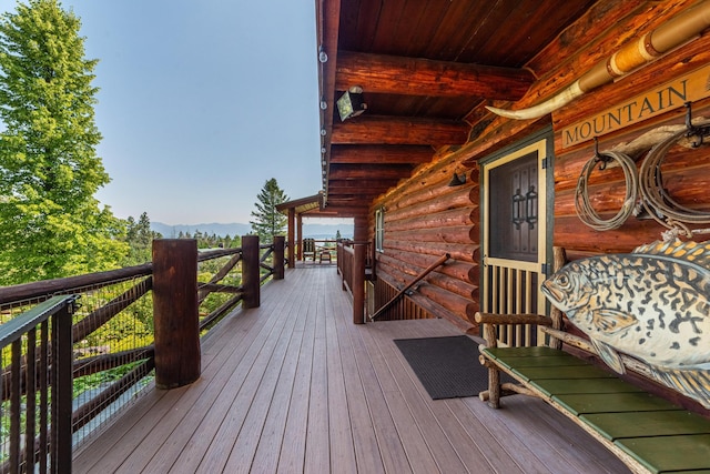 420 Deer Creek Rd, Lakeside, MT 59922 - wooden deck featuring a mountain view
