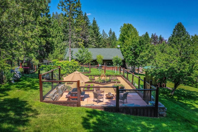 420 Deer Creek Rd, Lakeside, MT 59922 - view of playground with a garden and a lawn