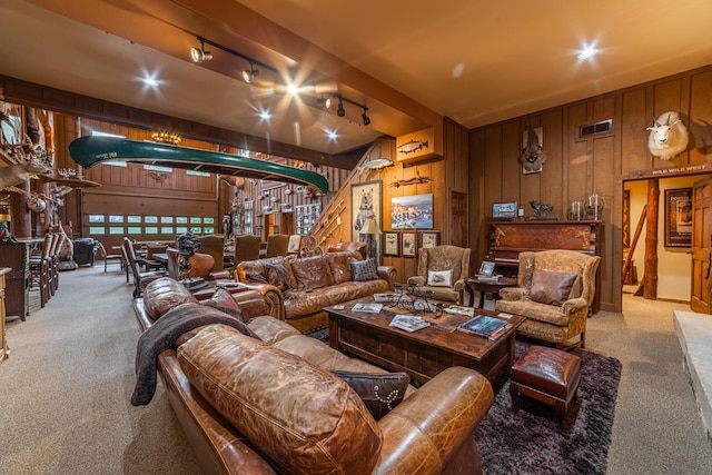 420 Deer Creek Rd, Lakeside, MT 59922 - carpeted living room with wood walls and rail lighting