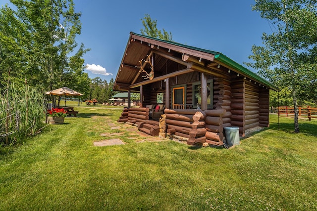420 Deer Creek Rd, Lakeside, MT 59922 - rear view of house featuring log exterior