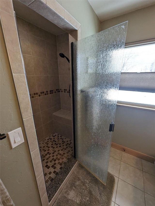 1611 Peosta Ave, Helena, MT 59601 - bathroom featuring a shower stall and tile patterned floors
