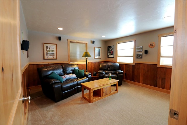 1611 Peosta Ave, Helena, MT 59601 - carpeted living area featuring wooden walls, wainscoting, and recessed lighting