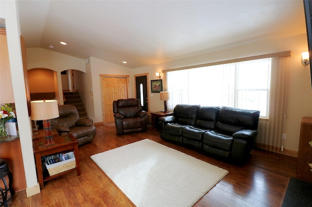 1611 Peosta Ave, Helena, MT 59601 - living area featuring wood finished floors, stairway, arched walkways, lofted ceiling, and recessed lighting