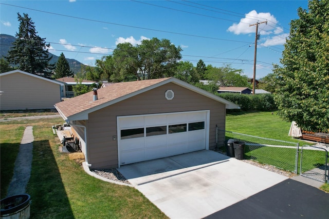 1611 Peosta Ave, Helena, MT 59601 - detached garage with driveway and fence