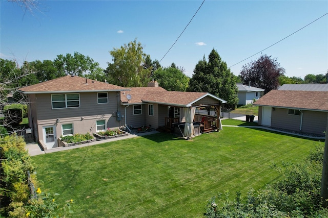 1611 Peosta Ave, Helena, MT 59601 - rear view of house featuring a yard, fence, and a chimney