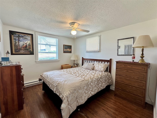 bedroom with a textured ceiling, baseboard heating, ceiling fan, and dark wood-style floors