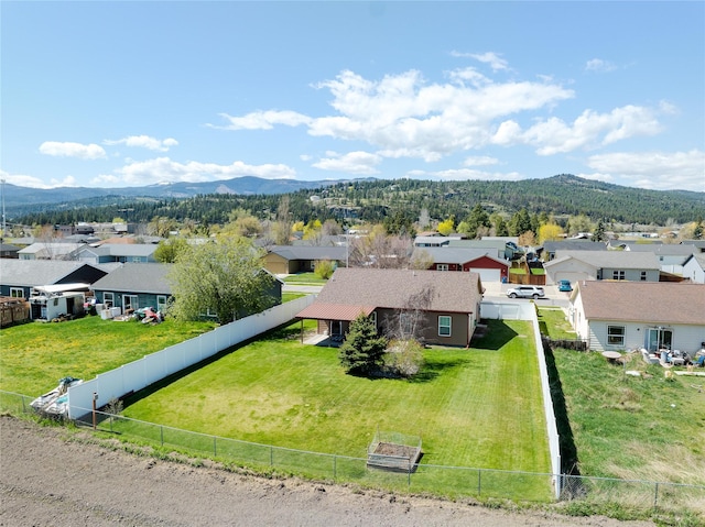 drone / aerial view with a mountain view and a residential view