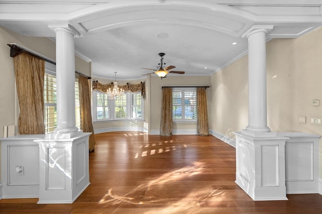 305 Columbia Ave, Whitefish, MT 59937 - unfurnished living room featuring decorative columns, wood finished floors, a ceiling fan, and ornamental molding