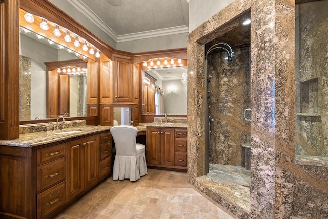 305 Columbia Ave, Whitefish, MT 59937 - bathroom with crown molding, a shower stall, two vanities, and stone finish flooring