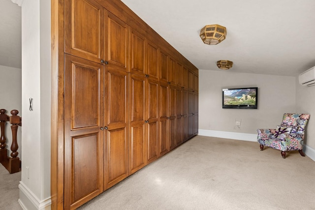 305 Columbia Ave, Whitefish, MT 59937 - sitting room featuring light colored carpet, an AC wall unit, and lofted ceiling