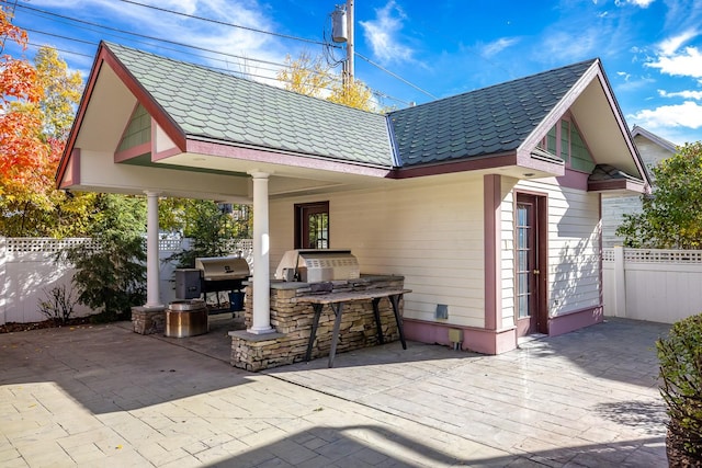 305 Columbia Ave, Whitefish, MT 59937 - view of patio / terrace featuring an outdoor kitchen and exterior bar