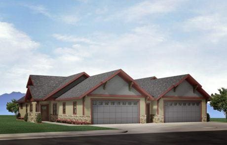 view of front facade with concrete driveway, a garage, stone siding, and a front yard
