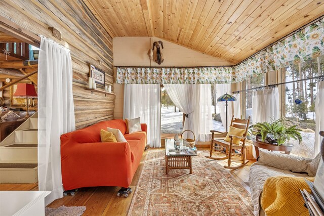 1441 Bonanza Dr, Sula, MT 59871 - living room with vaulted ceiling, wooden ceiling, and hardwood / wood-style floors
