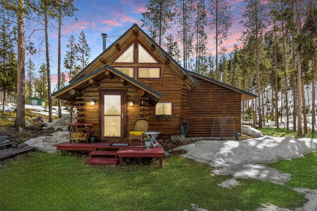 1441 Bonanza Dr, Sula, MT 59871 - rear view of property with log siding and a yard