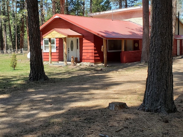 4056 Snow Fleury Ln, Lincoln, MT 59639 - view of front of house featuring metal roof