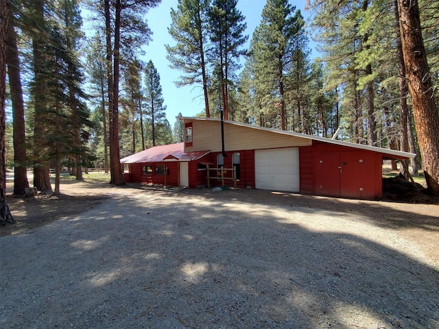 4056 Snow Fleury Ln, Lincoln, MT 59639 - garage featuring driveway
