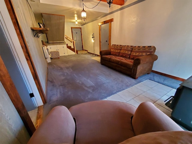4056 Snow Fleury Ln, Lincoln, MT 59639 - living area featuring carpet floors, baseboards, stairs, and tile patterned flooring
