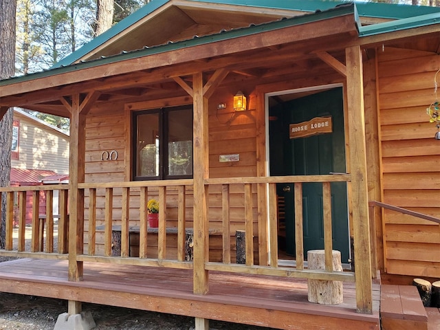 4056 Snow Fleury Ln, Lincoln, MT 59639 - property entrance with metal roof