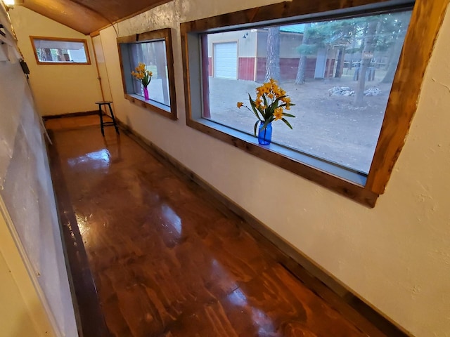4056 Snow Fleury Ln, Lincoln, MT 59639 - corridor with lofted ceiling and baseboards