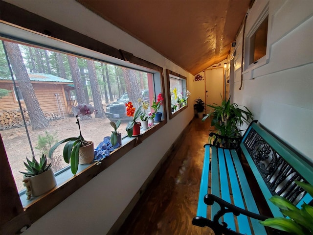 4056 Snow Fleury Ln, Lincoln, MT 59639 - hall with lofted ceiling and wood finished floors